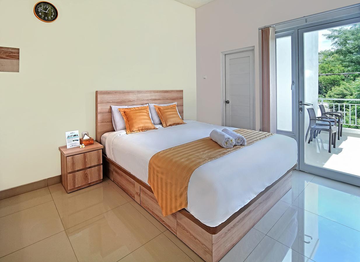 Wika Bali Beach House جيمباران الغرفة الصورة